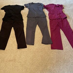 Stylish Women's Scrub Set - Black, Gray, and burgundy in size medium.